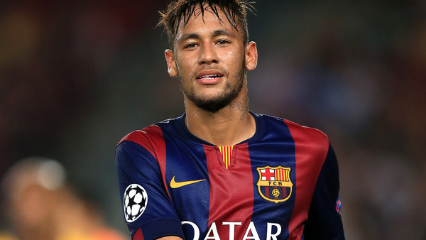 Barcelona's Neymar celebrates after scoring his side's fourth goal during a Group H Champions League soccer match between FC Barcelona and Celtic FC at the Camp Nou stadium in Barcelona, Spain, Wednesday Dec. 11, 2013.(AP Photo/Emilio Morenatti)