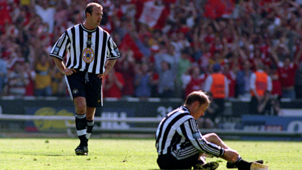 Dejection for Newcastle United's Alan Shearer (standing) and David Batty after Newcastle were defeated 2-0 by Arsenal in the FA Cup Final at Wembley this afternoon (Saturday). Photo by Owen Humphreys/PA