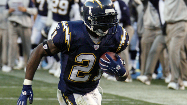 FILE - This Dec. 10, 2006 file photo shows San Diego Chargers running back LaDainian Tomlinson turning the corner on a seven-yard touchdown run during the fourth quarter of the Chargers' 48-20 victory over the Denver Broncos in a football game in San Dieg