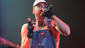 Editorial Use Only and No Merchandising: American rap singer Eminem performing on stage at the Manchester Evening News Arena, in Manchester, during the first gig of his brief UK tour.