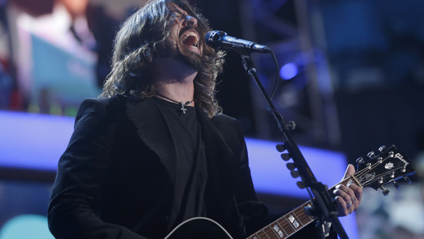 Foo Fighters performs at the Democratic National Convention in Charlotte, N.C., on Thursday, Sept. 6, 2012. (AP Photo/Charles Dharapak)