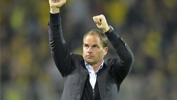Ajax head coach Frank de Boer reacts to supporters after losing the Champions League Group D soccer match between Borussia Dortmund and Ajax Amsterdam in Dortmund, Germany, Tuesday, Sept. 18, 2012. Dortmund defeated Amsterdam with 1-0. (AP Photo / Martin 