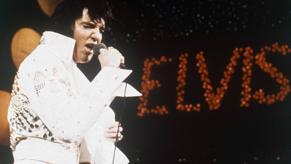 FILE - This 1972 file photo shows Elvis Presley during a performance. A three-CD box set slated for release the first week of August 2013 chronicles two recording sessions by Elvis Presley at the renowned Stax Records in Memphis in 1973. (AP Photo, files)