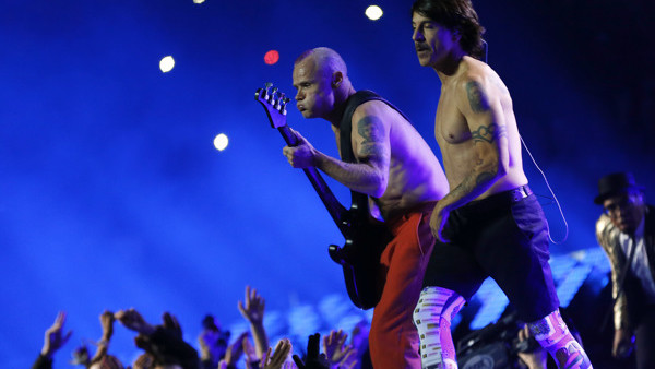 Anthony Kiedis, right, and Flea of the Red Hot Chili Peppers perform during the Pepsi halftime during the NFL Super Bowl XLVIII football game at MetLife Stadium Sunday, Feb. 2, 2014, in East Rutherford, N.J. The Seahawks beat the Broncos 43-8. (AP Photo/P