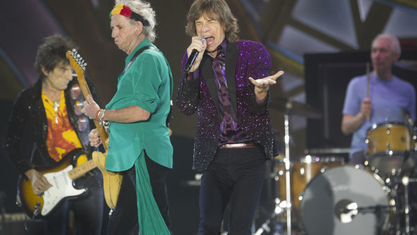 Rolling Stones singer Mick Jagger, performs with Keith Richards, Ronnie Wood, left, and drummer Charlie Watts during a concert in Hayrkon Park in Tel Aviv, Israel, Wednesday, June 4, 2014. (AP Photo/Ariel Schalit)