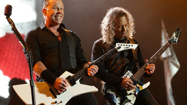James Hetfield (left) and Kirk Hammett of Metallica performing on the Pyramid Stage at the Glastonbury Festival, at Worthy Farm in Somerset.