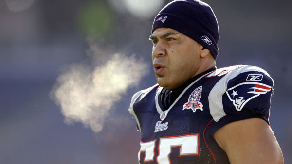 FILE - In this Jan. 10, 2010 file photo, New England Patriots linebacker Junior Seau (55) warms up on the field before an NFL wild-card playoff football game in Foxborough, Mass. The family of Junior Seau has opted out of the proposed NFL settlement with 