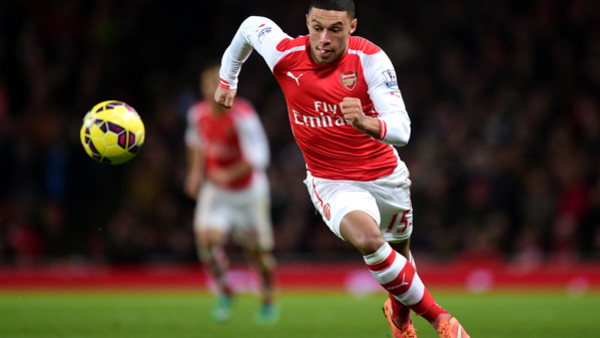 Arsenal's Alexis Sanchez gestures toward the assistant referee as he disputes a decision during their English Premier League soccer match between Arsenal and Swansea City at the Emirates stadium in London, Monday,May 11, 2015. (AP Photo/Alastair Grant