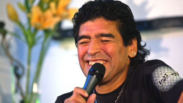 Former Argentine soccer star Diego Maradona gestures during the press conference held after the premiere of his TV show called