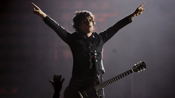 Billy Joe Armstrong, lead singer of Green Day, performs during the MTV Europe Music Awards ceremony Thursday, Nov. 3, 2005, at the Atlantic Pavillion in Lisbon, Portugal. Green Day won both the Best Rock and Best Album awards. (AP Photo/Armando Franca)