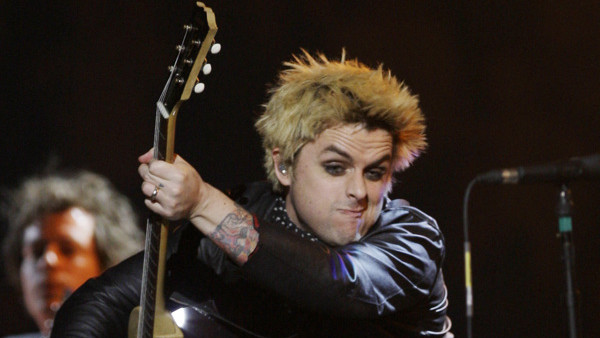 Billie Joe Armstrong of U.S. band Green Day performs at the 2009 MTV European Music Awards in Berlin, Thursday Nov. 5, 2009. (AP Photo/Joel Ryan)