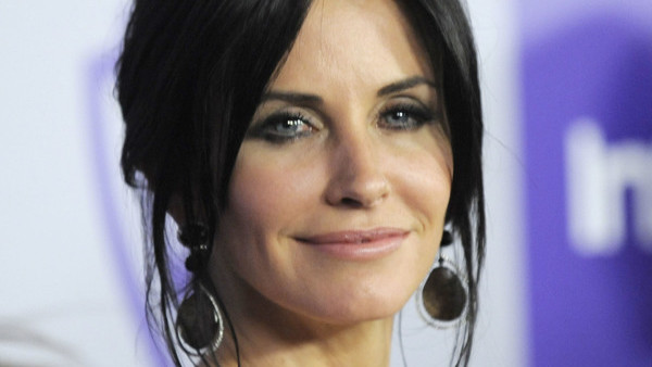Courteney Cox arrives to the InStyle/Warner Bros. party following the 67th Annual Golden Globe Awards on Sunday, Jan. 17, 2010, in Beverly Hills, Calif. (AP Photo/Chris Pizzello)