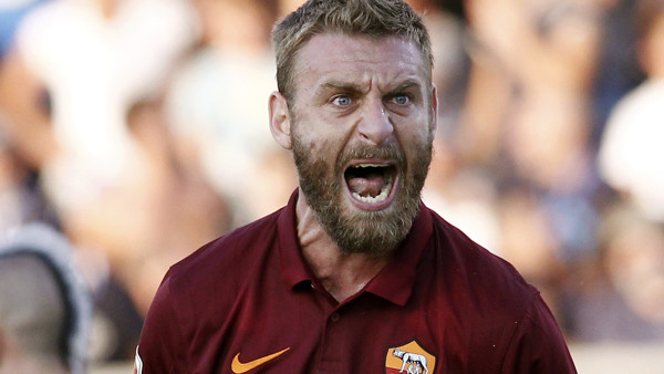 Roma's Daniele De Rossi shouts during a Serie A soccer match between Empoli and Roma, in Empoli, Italy, Saturday, Sept. 13, 2014. (AP Photo/Paolo Lazzeroni)
