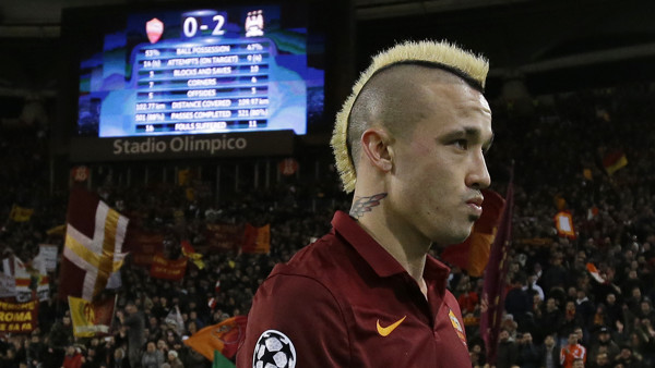 Roma's Radja Nainggolan leaves the pitch at the end of a Group E Champions League soccer match between Roma and Manchester City at the Olympic stadium in Rome, Italy, Wednesday Dec.10, 2014. (AP Photo/Gregorio Borgia)