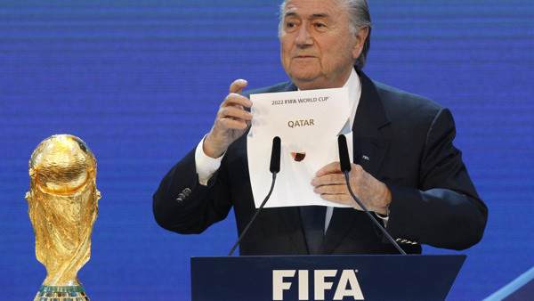 FILE - In this Thursday, Dec. 2, 2010 file photo, FIFA President Sepp Blatter announces Qatar to host the 2022 World Cup during the announcement of the host country for the 2022 soccer World Cup in Zurich, Switzerland. A FIFA task force on Tuesday, Feb. 2