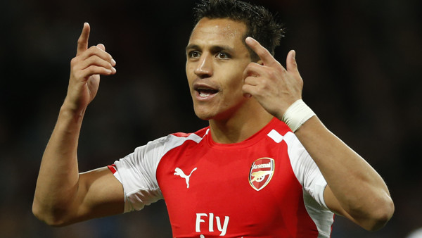 Arsenal's Alexis Sanchez gestures toward the assistant referee as he disputes a decision during their English Premier League soccer match between Arsenal and Swansea City at the Emirates stadium in London, Monday,May 11, 2015. (AP Photo/Alastair Grant