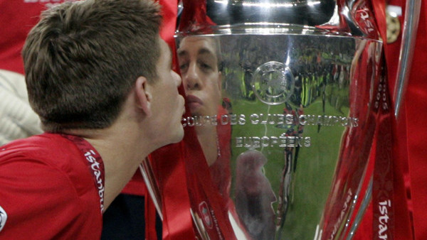 Liverpool captain Steven Gerrard kisses the UEFA Champions League trophy.