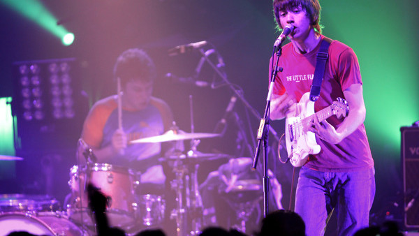 British band Arctic Monkeys members Alex Turner, right, and drummer Matt Helders perform during their concert at Guildhall in Portsmouth, England, Wednesday, Feb 15, 2006. (AP Photo/Sang Tan)
