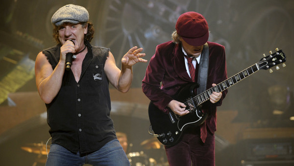 FILE - In this Nov. 12, 2008 file photo, AC/DC lead singer Brian Johnson, left, and Angus Young perform on the Black Ice tour at Madison Square Garden in New York. Columbia Records and Apple announced Monday, Nov. 19, 2012, that the classic rock band'