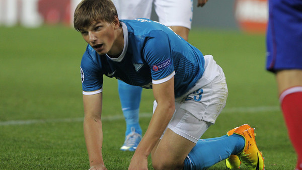 Zenit St Petersburg Andrey Arshavin gets to his feet during a Group G Champions League soccer match against Atletico Madrid at the Vicente Calderon stadium in Madrid, Wednesday, Sept. 18, 2013. (AP Photo/Andres Kudacki)