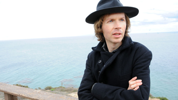 FILE - In this Dec. 14, 2012 file photo, musician Beck poses for a portrait at his home, in Malibu, Calif. Beck Ed Sheeran, Sam Smith and the Electric Light Orchestra are among a new batch of performers added to the bill for Sunday night's Grammy Awar