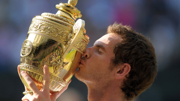 File photo dated 07-07-2013 of Great Britain's Andy Murray kisses the trophy after beating Serbia's Novak Djokovic on day thirteen of the Wimbledon Championships at The All England Lawn Tennis and Croquet Club, Wimbledon.