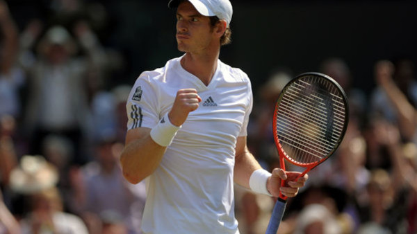 File photo dated 07-07-2013 of Great Britain's Andy Murray kisses the trophy after beating Serbia's Novak Djokovic on day thirteen of the Wimbledon Championships at The All England Lawn Tennis and Croquet Club, Wimbledon.