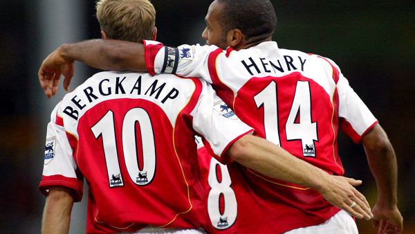Arsenal's Thierry Henry celebrates his goal against Norwich City with Dennis Bergkamp