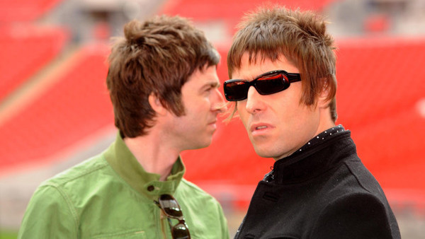 Singer-songwriter Noel Gallagher (left) and his brother Liam (right), from the pop group Oasis, at the NME Carling Awards at The Planit Arches, Shoreditch, in east London. 18/8/01: Fans of Oasis have a chance to see the anniversary show as tickets go on s