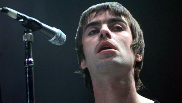 Singer-songwriter Noel Gallagher (left) and his brother Liam (right), from the pop group Oasis, at the NME Carling Awards at The Planit Arches, Shoreditch, in east London. 18/8/01: Fans of Oasis have a chance to see the anniversary show as tickets go on s