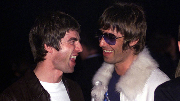 Singer-songwriter Noel Gallagher (left) and his brother Liam (right), from the pop group Oasis, at the NME Carling Awards at The Planit Arches, Shoreditch, in east London. 18/8/01: Fans of Oasis have a chance to see the anniversary show as tickets go on s