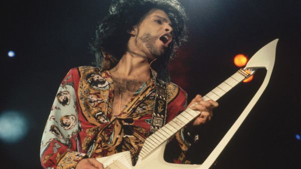 Prince Plays Electric Guitar in Concert