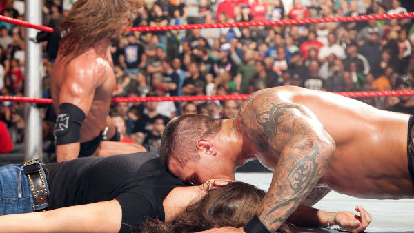 Randy Orton Triple H Stephanie McMahon 2009.jpg