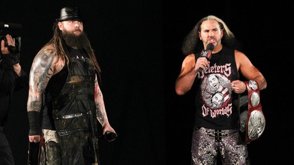 Seth Rollins holds back Dean Ambrose