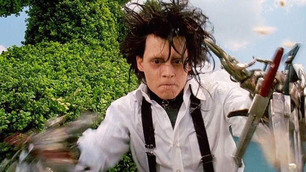 Edward Scissorhands, like Tim Burton, just can't reach out and touch others
