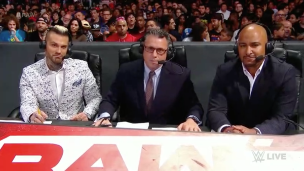 Triple H Michael Cole Tom Phillips